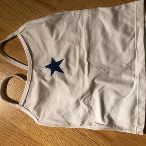 white shirt with blue star